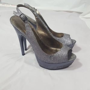 Sling back silver high heel
